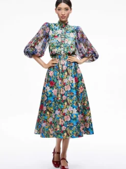 Earla Vegan Leather Flare Skirt + Ilan Smocked Sleeve Button Front Blouse